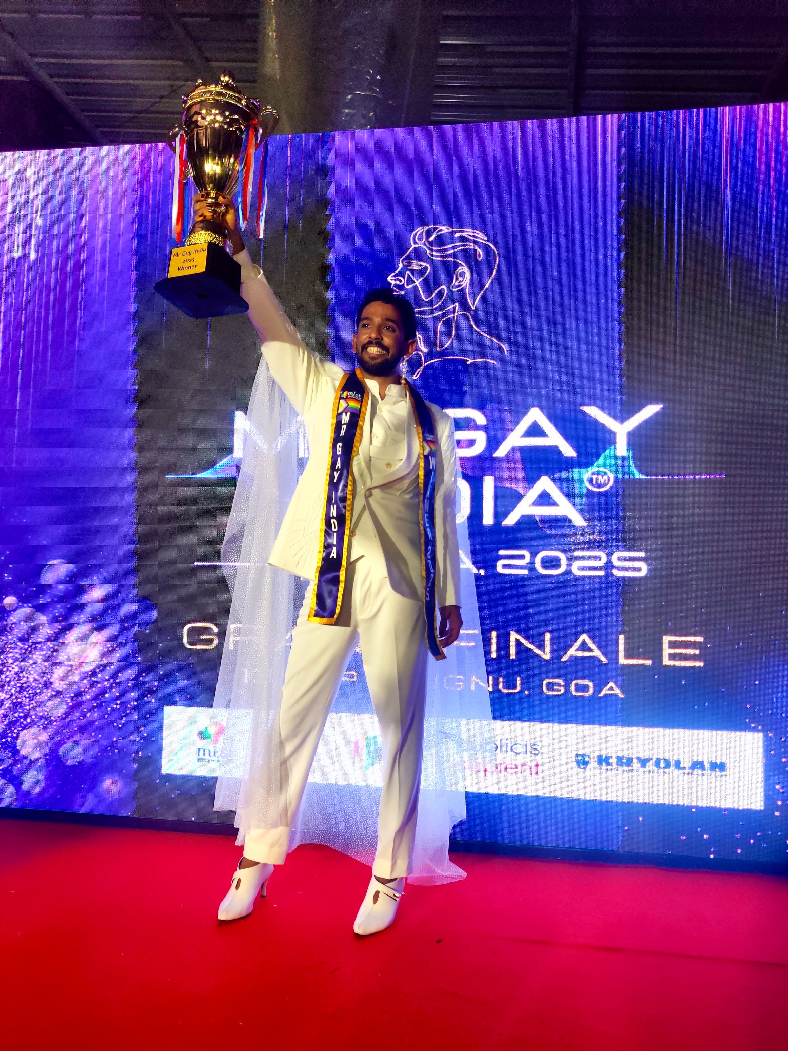 Vrujen celebrating a Mr Gay India win